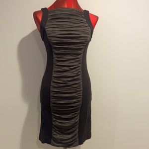 Nicole Miller Brand Dress with middle Ruching style in front and back.